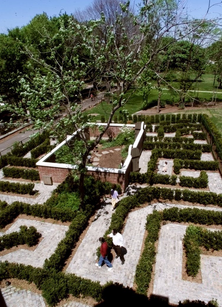 A walled garden, a tree and a maze.