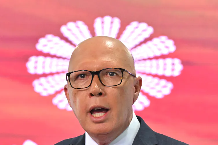 man against red and white background