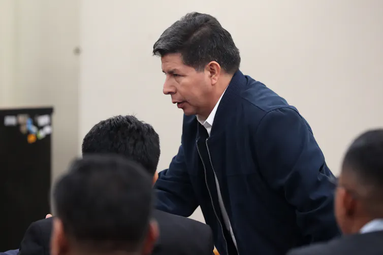Former Peruvian president Pedro Castillo attends a trial hearing.