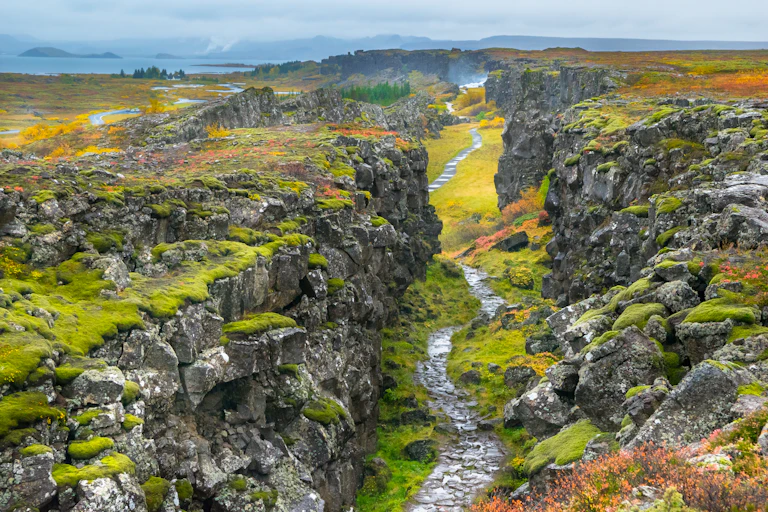 A canyon between two large rock faces.