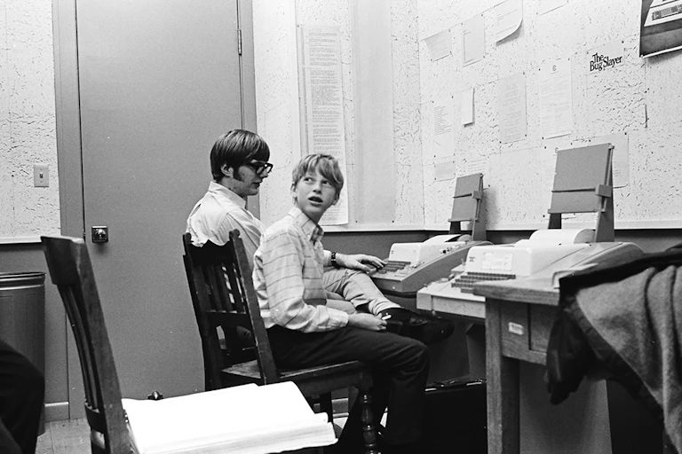 A black and white picture of the two founders of Microsoft, five years before it was created.