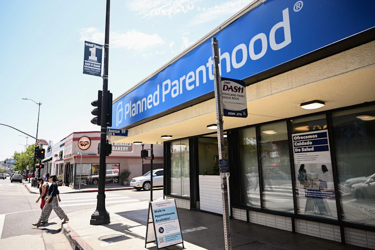 Planned Parenthood signage is displayed outside of a health care clinic.