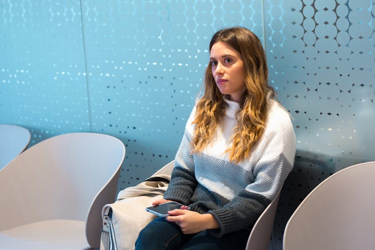 Woman waits for appointment