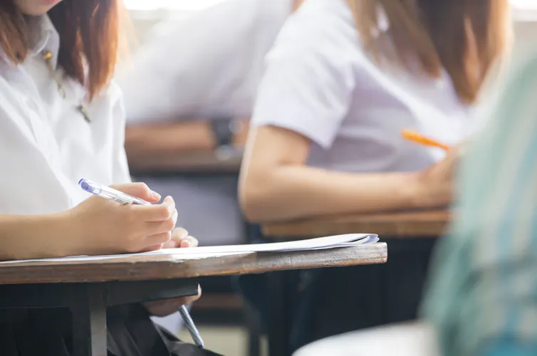 Girls taking exam