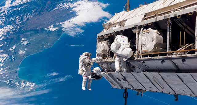 Astronauts aboard the ISS.