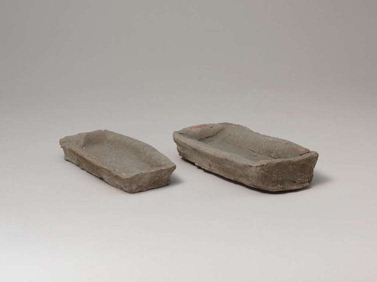 two very plain clay trays