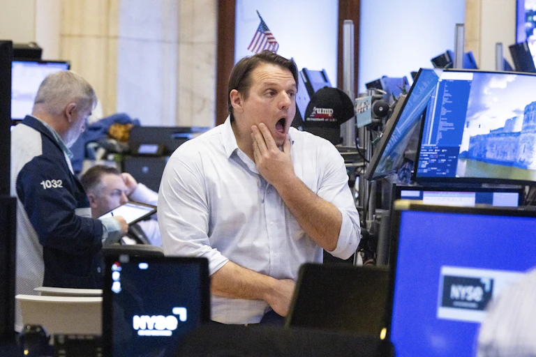 A trader at the end of the trading day on the New York Stock Exchange on Friday.