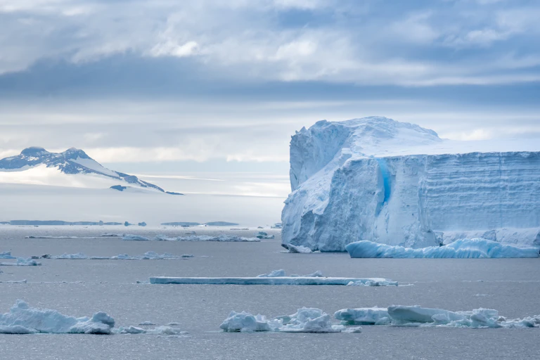 A view of Antarctica from the sea, with icebergs calved from the Ross Ice Shelf of Antarctica.