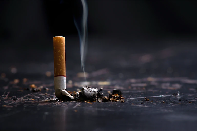 A cigarette being stubbed out