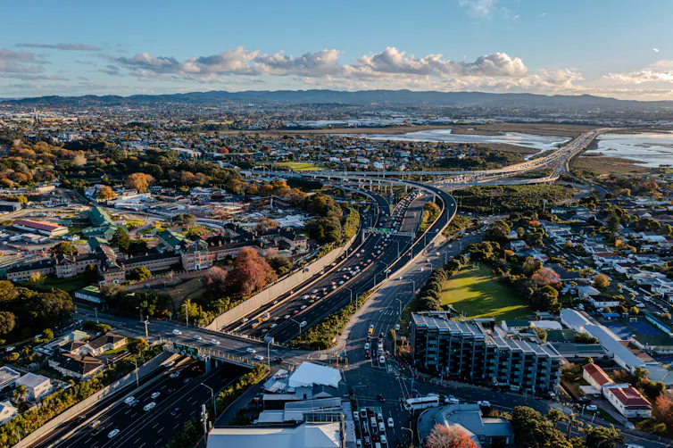 Congested multi-lane highway and dense housing