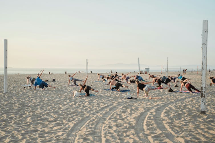 Beach yoga class