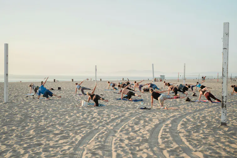 Beach yoga class