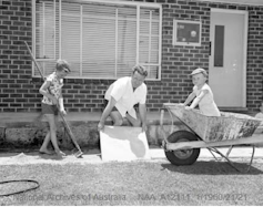 A man and two young kids.