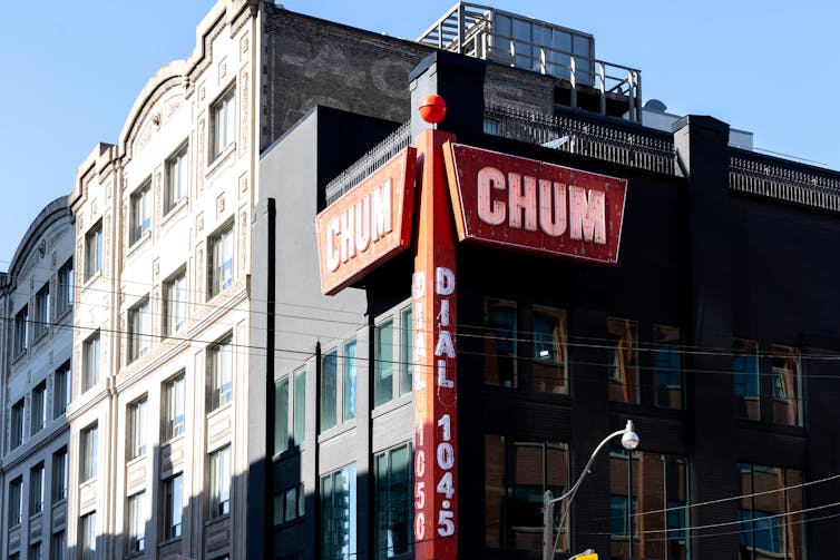 The words 'CHUM' seen alongside a building.