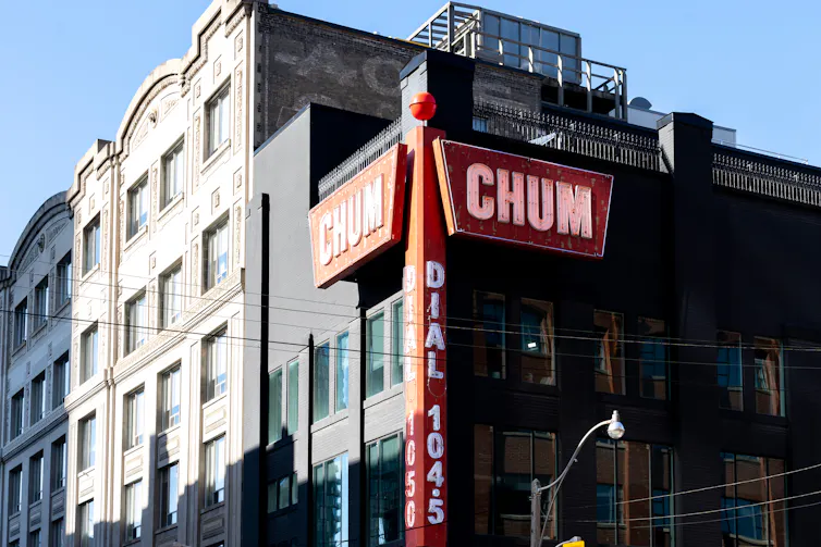 The words 'CHUM' seen alongside a building.