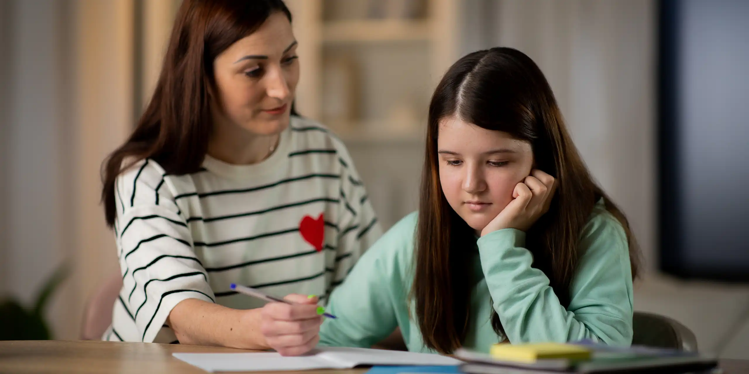 Mother and daughter doing homework