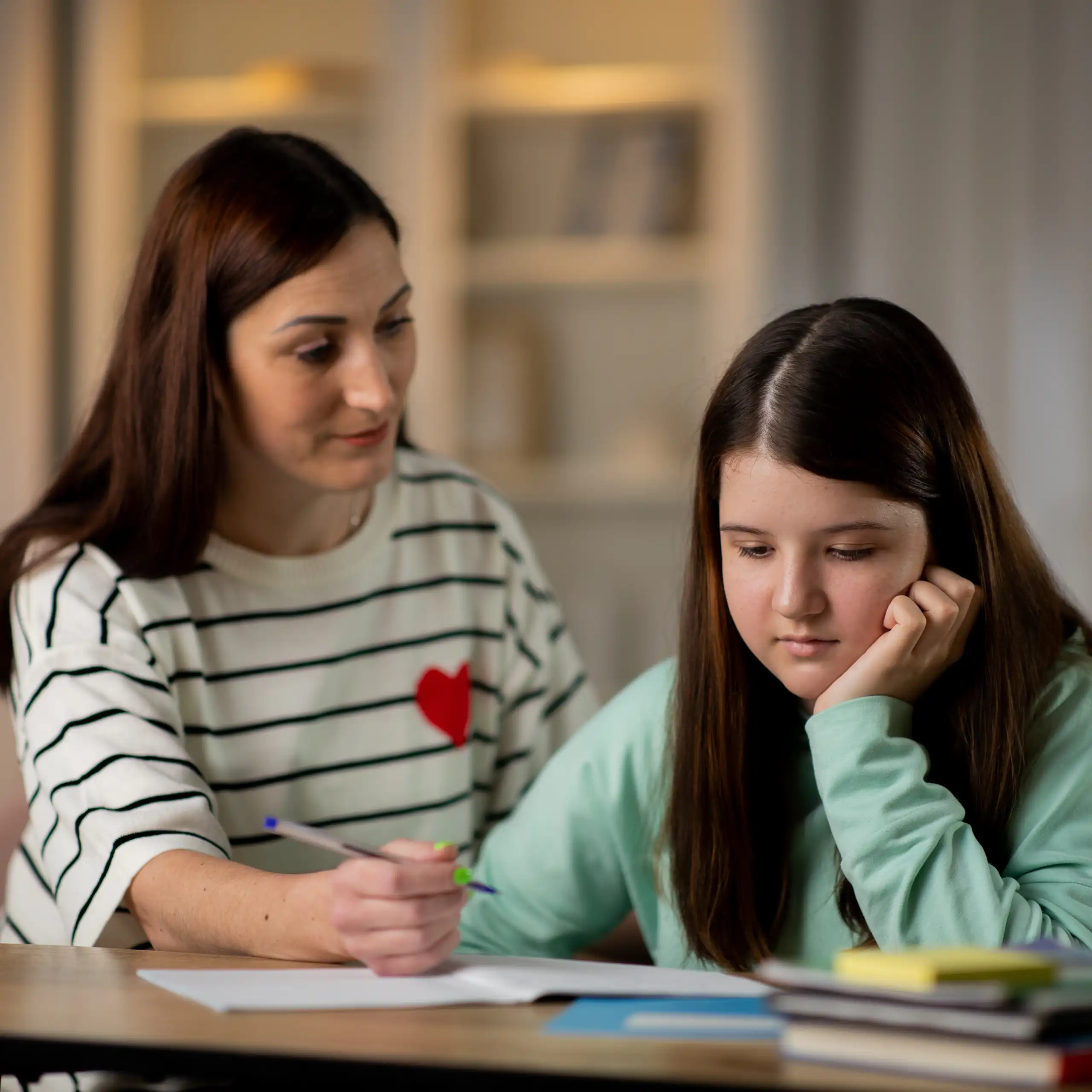 Mother and daughter doing homework