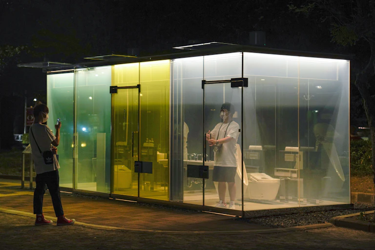 This public toilet, in Japan, features glass panes that turn opaque when a user enters the toilet booth and locks the door.