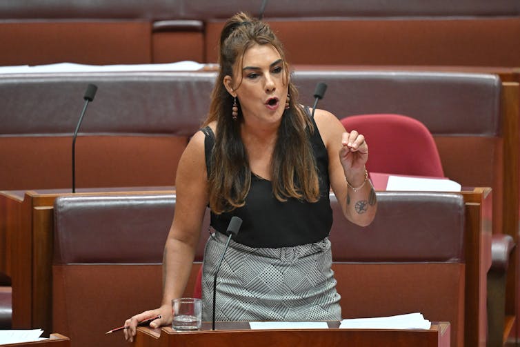 woman pointing in parliament
