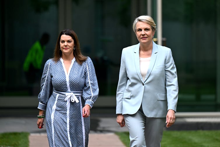 two women walking together