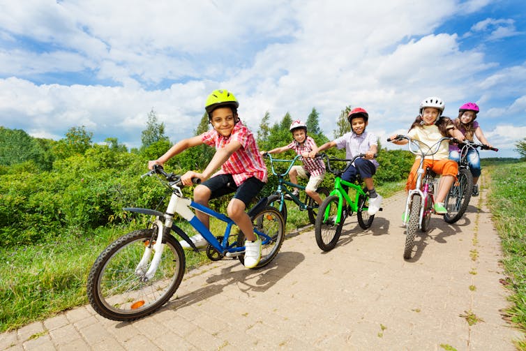 Children riding bikes outside
