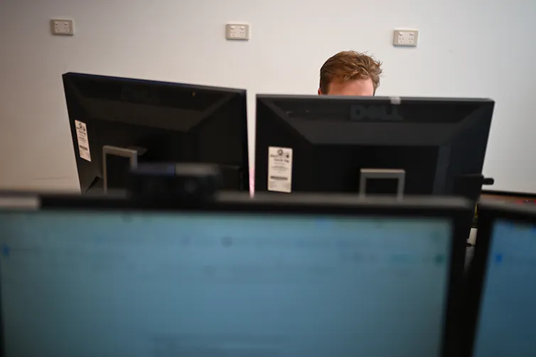 Worker at desk.