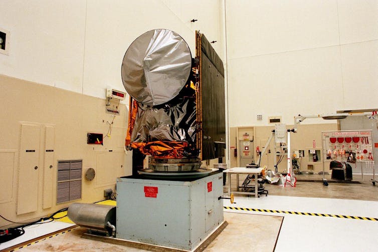 a space vessel being constructed inside a lab