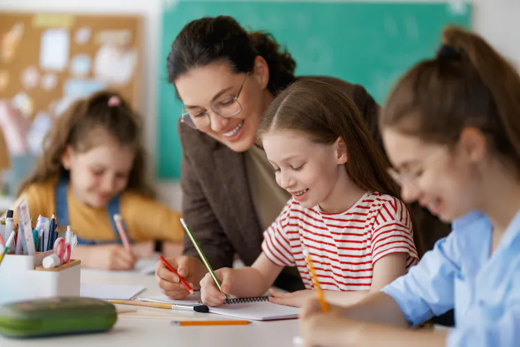 Young teacher and children