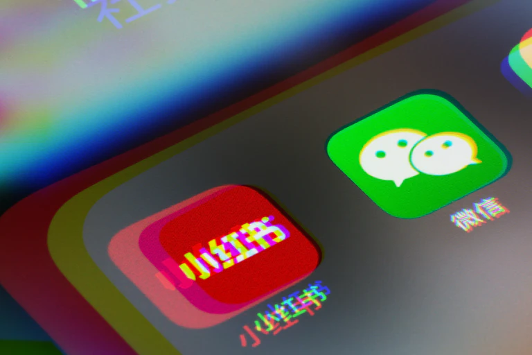 A smartphone with three Chinese social media apps glitching