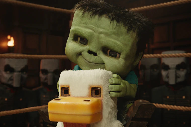 Movie still: a zombie on a chicken.
