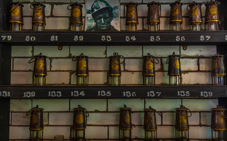old safety lamps on shelf