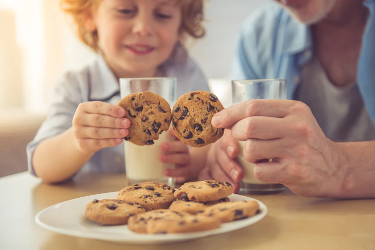 Child Getting Two Cookies TikTok’s cookie challenge: Why some children share and others don’t
