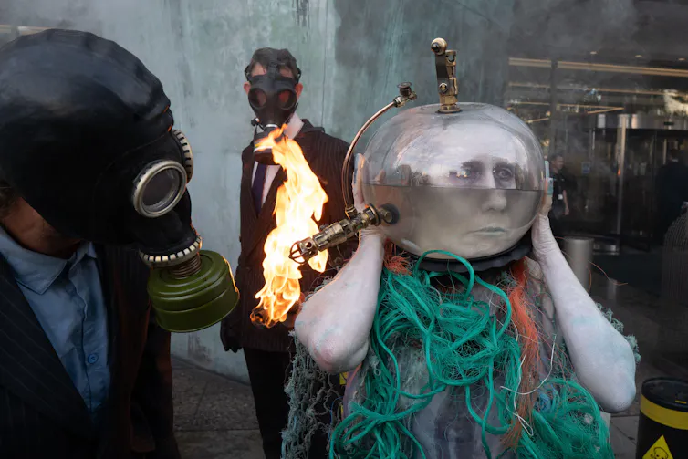 Woman with head in watery circle thingy