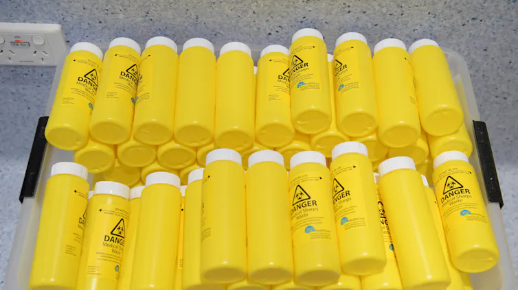 Tub filled with yellow plastic tubes.