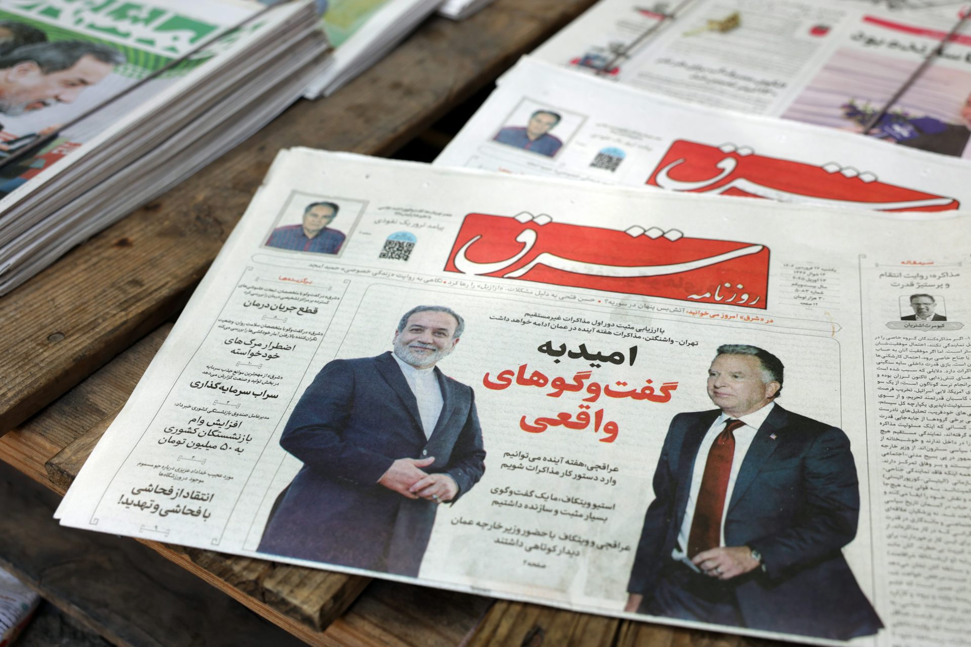 Iranian daily broadsheet newspaper with picture of Iranian foreign minister  Abbas Araghchi and US Special Envoy to the Middle East Steve Witkoff and headline in Farsi  reading 'Hope for real negotiations'