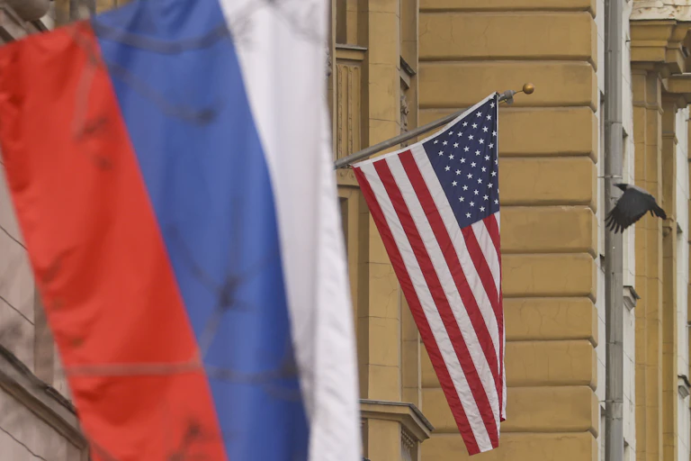 The Russian and US flags on the main building of the US embassy in Moscow, Russia.