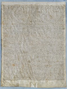A document on parchment with Latin written on it.