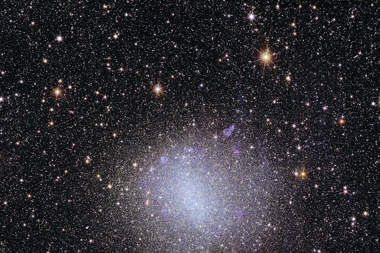 A deep view of many galaxies and stars in space