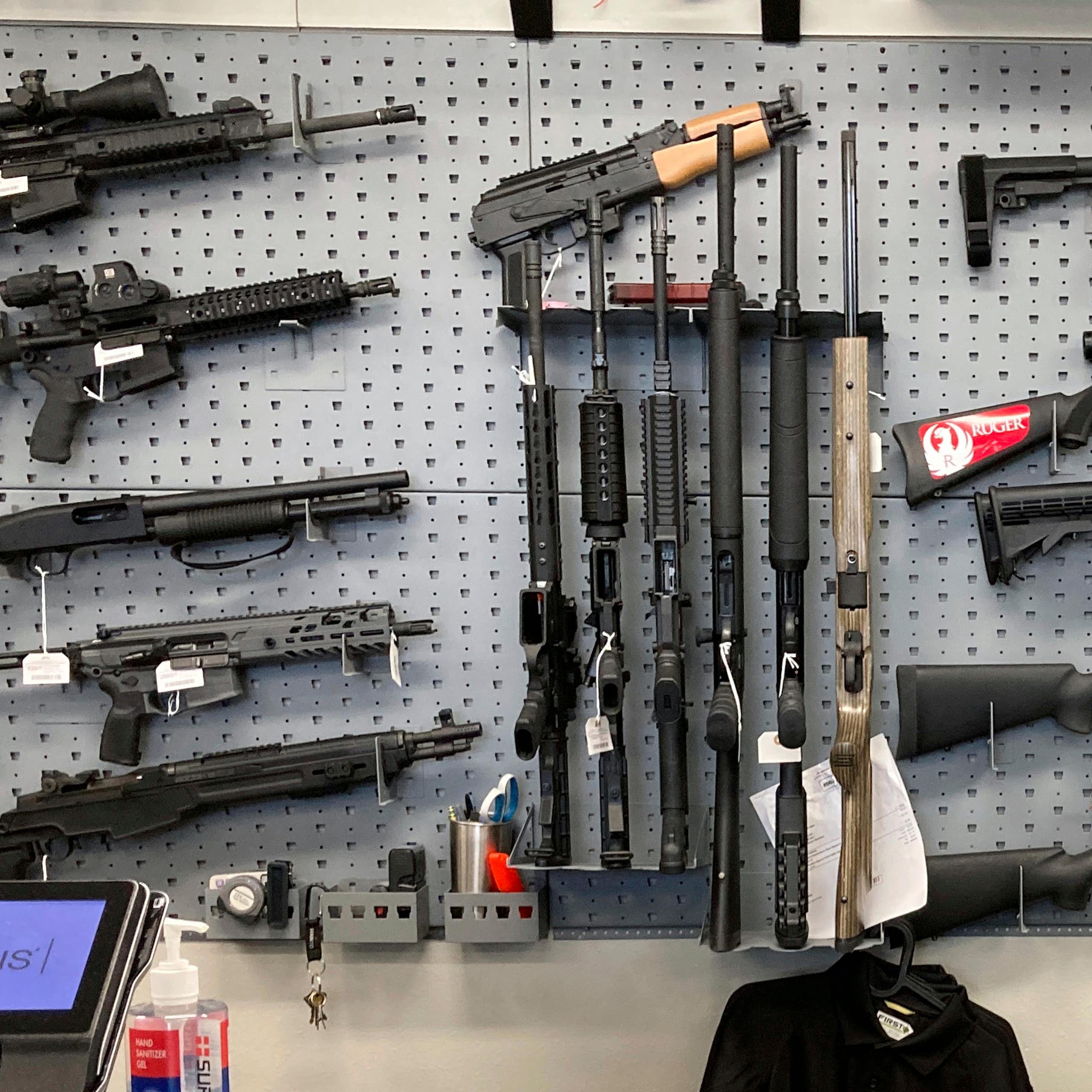 Rifles for sale on a wall