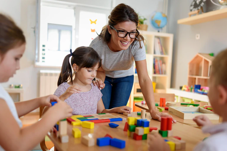 Preschool teacher with kids