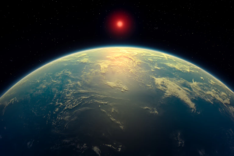 Large blue planet with a bright red dot in the distance.