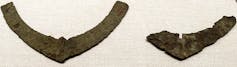 Two ancient iron plough blades.