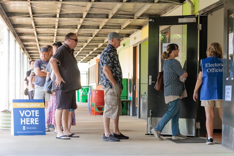 People queuing up to vote.