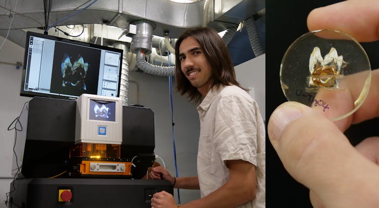 Photo of a man in front of a piece of equipment showing a scan on a screen.