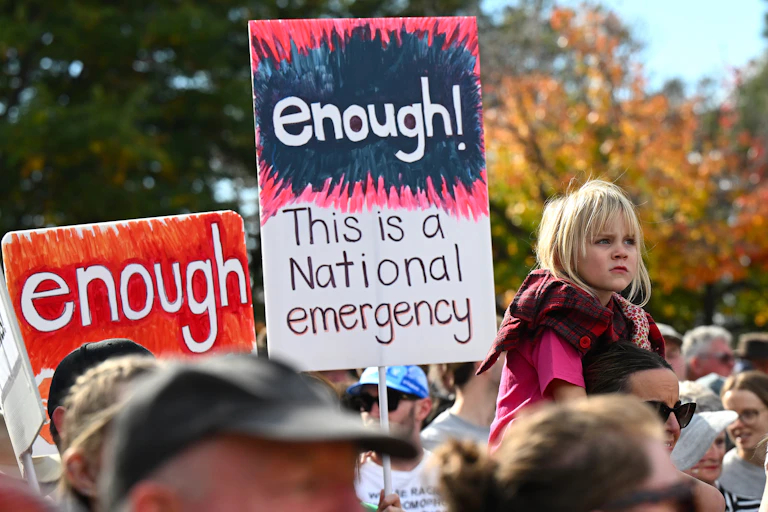 A protest sign saying enough, this is a national emergency