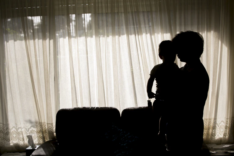 An Iranian woman living on a bridging visa is seen at a property in Melbourne