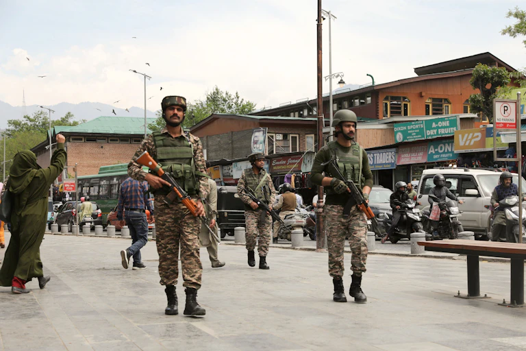 Indian security forces patrol the streets of Srinigar in Kashmir.