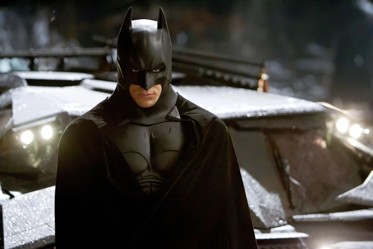 Christian Bale in a black Batman suit