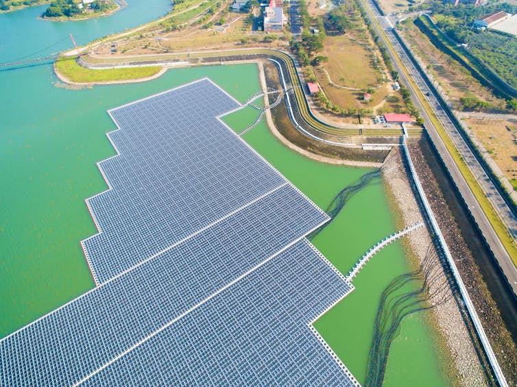 5 techniques to make towns extra resilient to local weather trade 2 solar panels on lake surface
