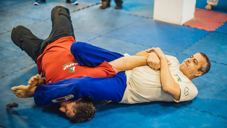 Function ache ranking? Right here’s the issue with that 1 A jiu-jitsu practitioner applying an armbar.